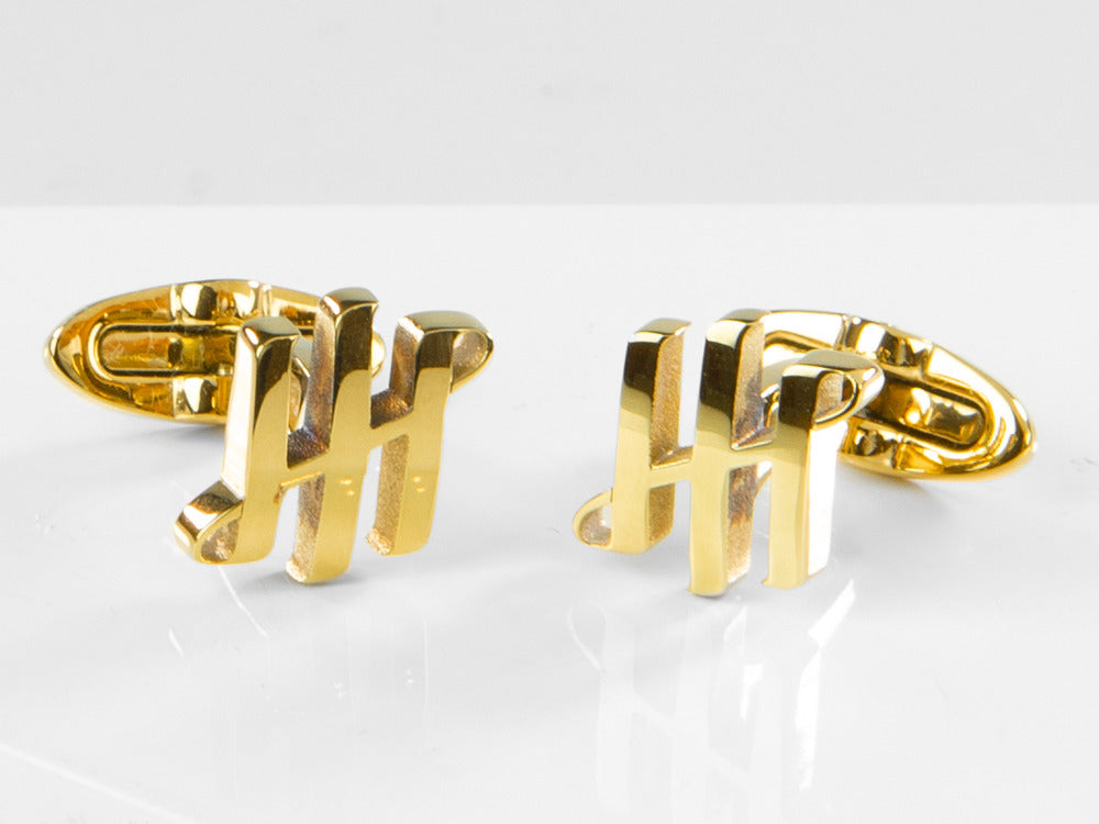 Gemelos Montegrappa Ambigram, Acero inoxidable, IP Yellow Gold, IDA2CLY0